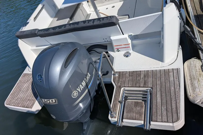 Slide: The Image of 2020 Jeanneau NC 695 Series 2 boat with Yamaha 150 outboard motor. - 23