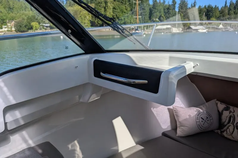 Slide: The Image of Interior of 2020 Jeanneau NC 695 Series 2 boat with scenic water view. - 9