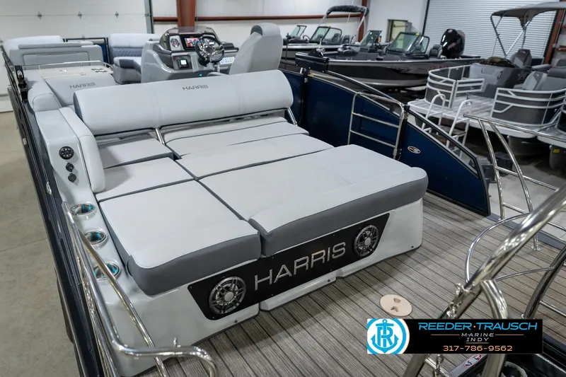 Slide: The Image of 2020 Harris Solstice pontoon boat with luxurious seating in showroom. - 11