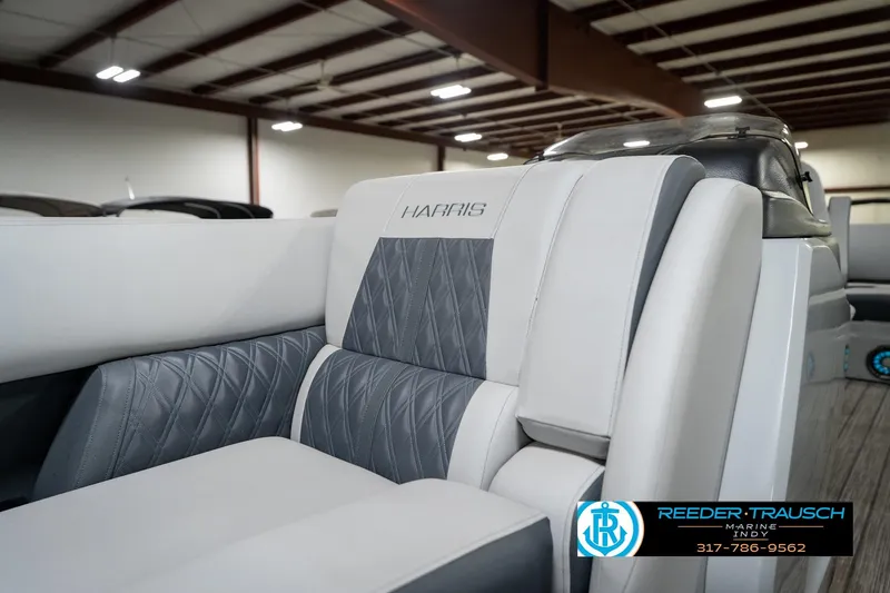 Slide: The Image of Interior of a 2020 Harris Solstice boat with luxurious seating and modern design. - 21