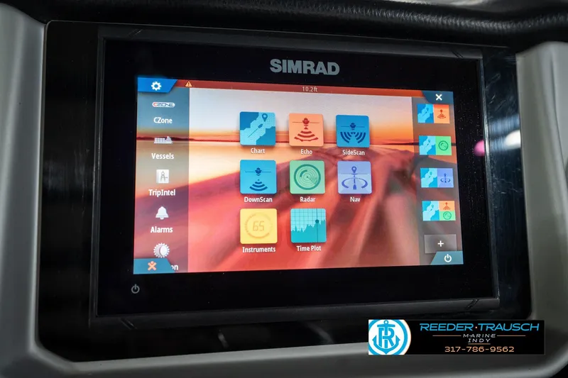 Slide: The Image of Close-up of 2020 Harris Solstice speedometer with Reeder-Trausch Marine logo. - 34
