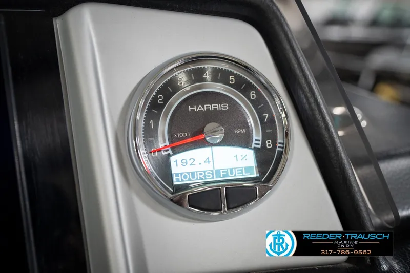 Slide: The Image of Simrad touchscreen display on 2020 Harris Solstice boat, featuring navigation and radar controls. - 35