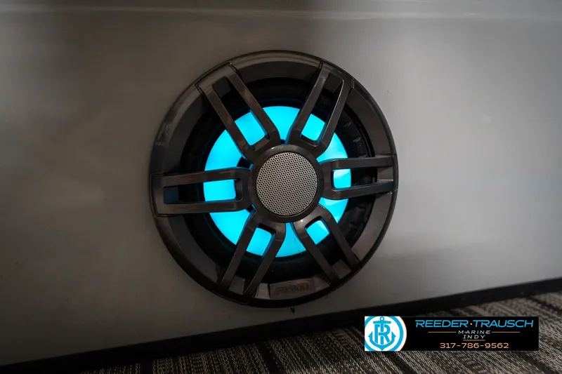 Slide: The Image of 2020 Harris Solstice boat interior with gray seating and speaker detail. - 44