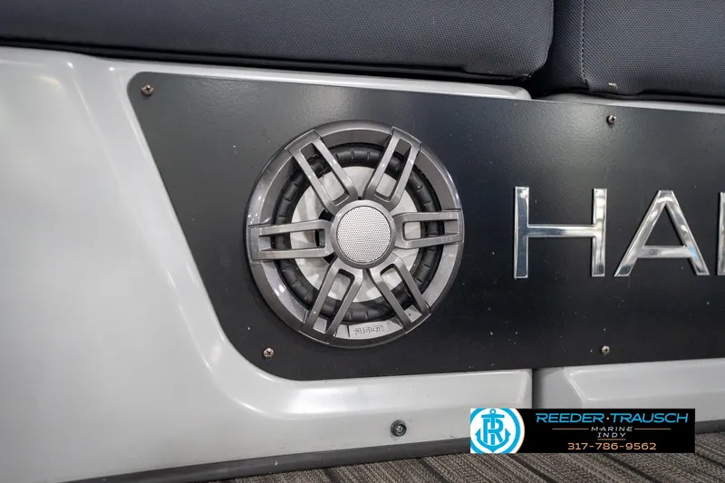 Slide: The Image of Illuminated speaker on 2020 Harris Solstice boat, featuring Reeder-Trausch Marine branding. - 45