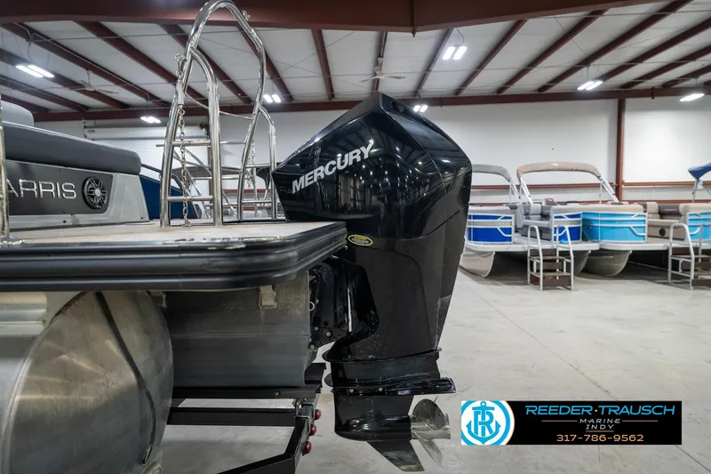 Slide: The Image of 2020 Harris Solstice pontoon boat with Mercury engine in showroom. - 53