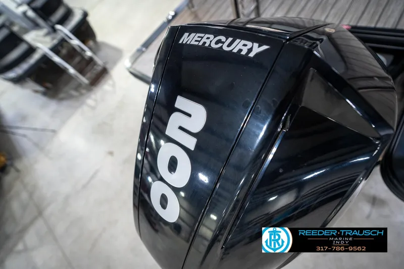 Slide: The Image of 2020 Harris Solstice boat with Mercury outboard motor in showroom. - 54