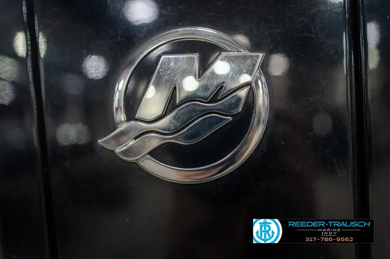 Slide: The Image of Mercury 200 outboard motor on 2020 Harris Solstice boat, Reeder-Trausch Marine logo visible. - 55