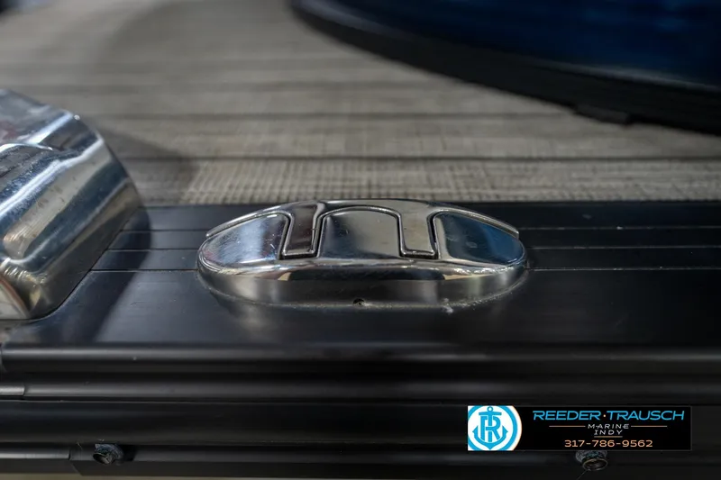 Slide: The Image of Propeller of a 2020 Harris Solstice boat on a trailer in a garage. - 57