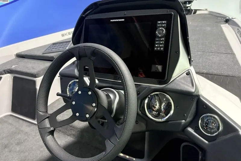 Slide: The Image of Steering wheel and dashboard of 2026 Skeeter ZXR20 SE boat with digital display. - 24
