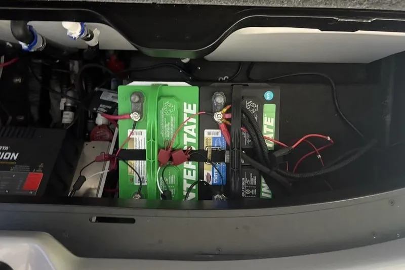 Slide: The Image of Battery compartment of 2026 Skeeter ZXR20 SE boat with wiring and components. - 29