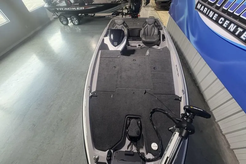 Slide: The Image of 2026 Skeeter ZXR20 SE fishing boat interior with seating and equipment in showroom. - 35