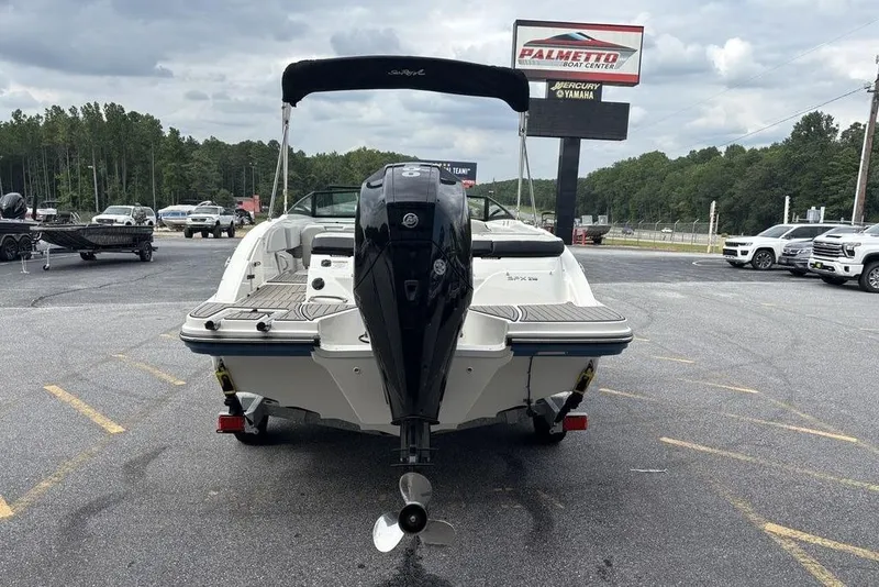 Slide: The Image of 2023 Sea Ray SPX 210 Outboard boat displayed at Palmetto Boat Center parking lot. - 3