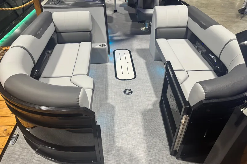 Slide: The Image of 2026 Veranda Relax VR235RC pontoon boat interior with gray seating and modern design. - 3