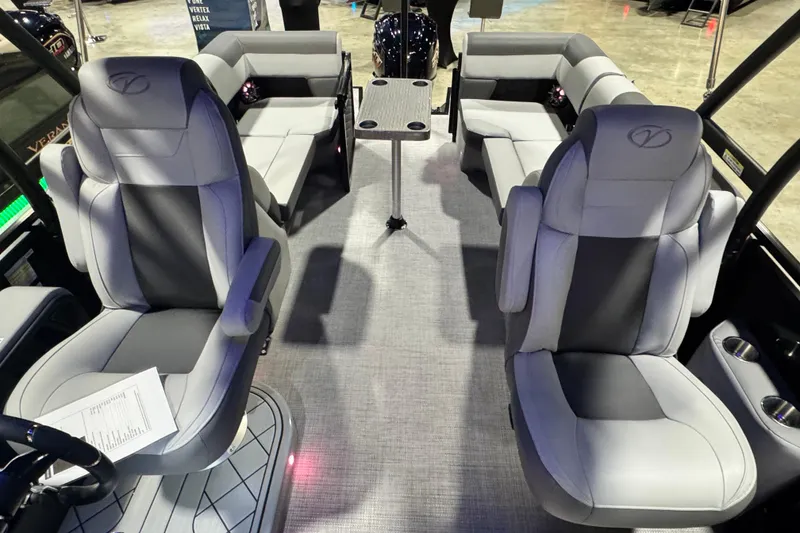 Slide: The Image of Luxurious interior of 2026 Veranda Relax VR235RC pontoon boat with plush seating and table. - 6