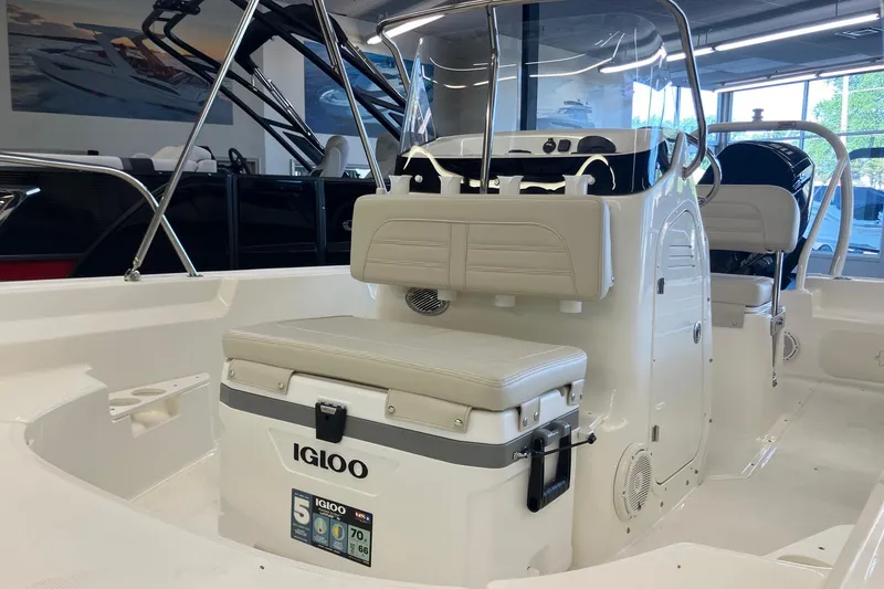 Slide: The Image of 2026 Boston Whaler 170 Montauk interior with Igloo cooler and seating. - 8