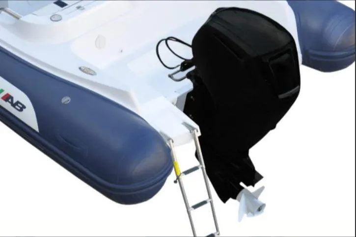 Slide: The Image of AB Inflatables Oceanus 21 VST 2026 with outboard motor and ladder. - 6