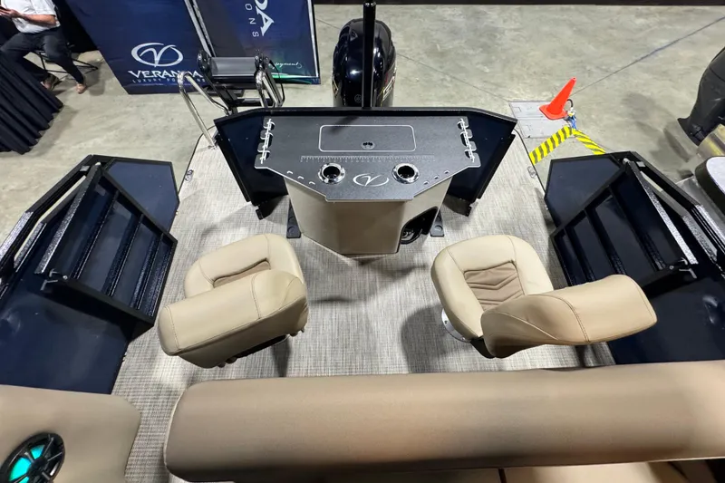 Slide: The Image of 2026 Veranda Relax VR235F2 boat interior with beige seats and control panel. - 10