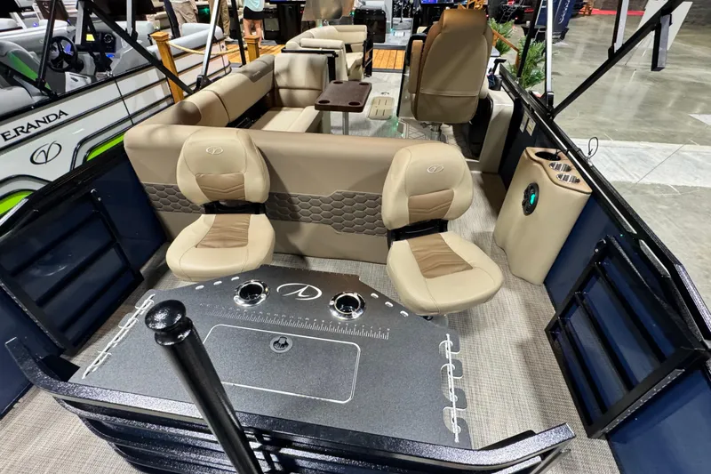 Slide: The Image of 2026 Veranda Relax VR235F2 pontoon boat interior with beige seating and modern design. - 13