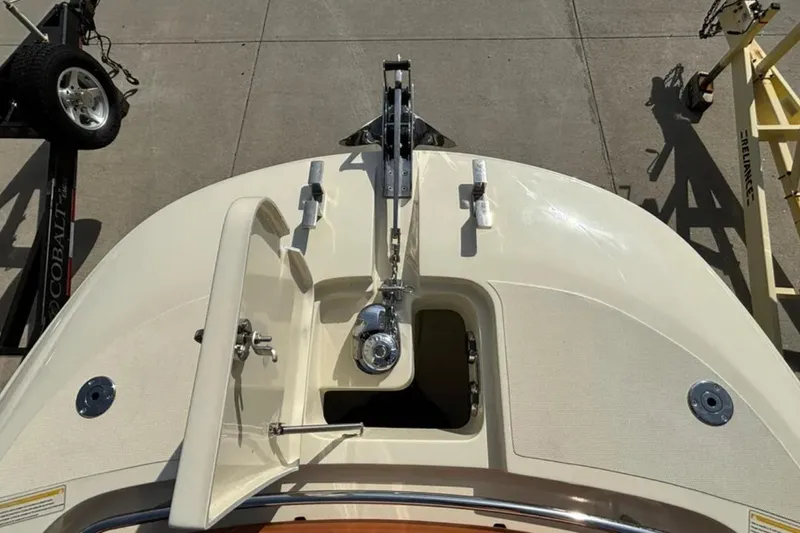Slide: The Image of 2024 Capoforte FX270 boat deck with anchor and hatch, viewed from above. - 16
