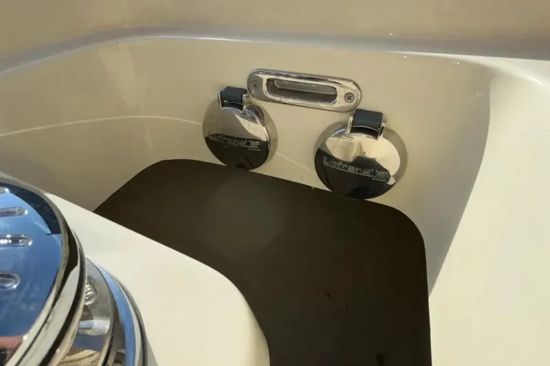 Slide: The Image of 2024 Capoforte FX270 boat detail with chrome fittings and sleek design. - 18