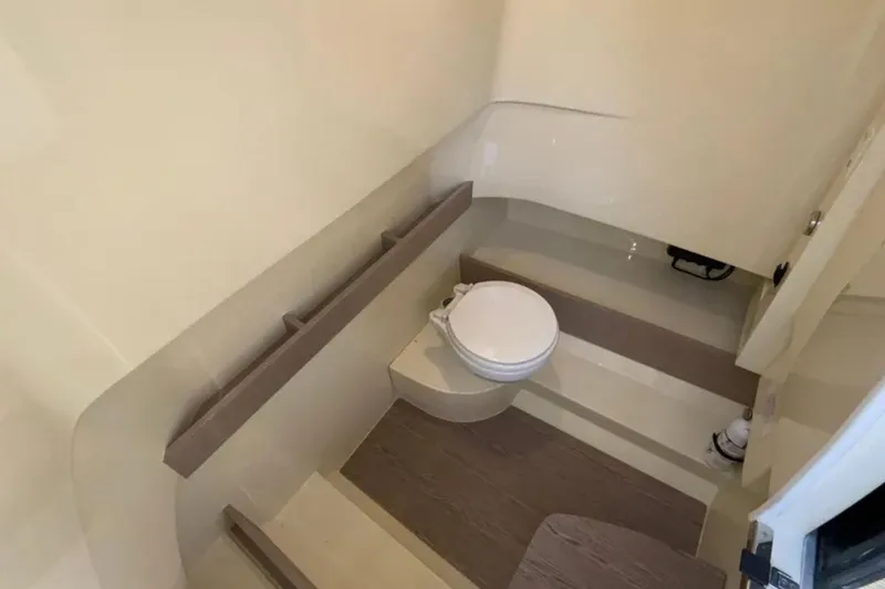 Slide: The Image of 2024 Capoforte FX270 boat interior bathroom with modern design and compact toilet. - 22