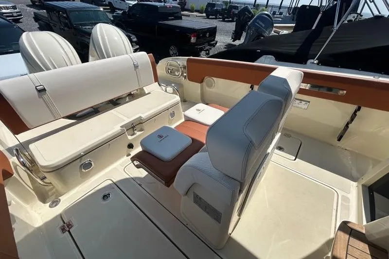 Slide: The Image of 2024 Capoforte FX270 boat interior with luxurious seating and modern design. - 6