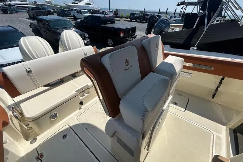 Slide: The Image of 2024 Capoforte FX270 boat interior with luxurious seating and modern design. - 7