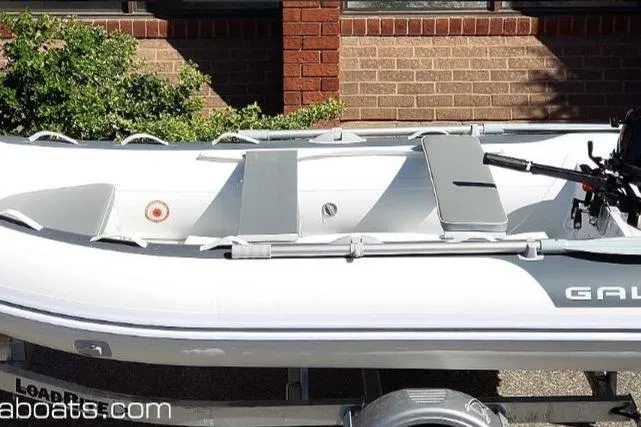Slide: The Image of Gala A270D inflatable boat 2025 on trailer, side view. - 5