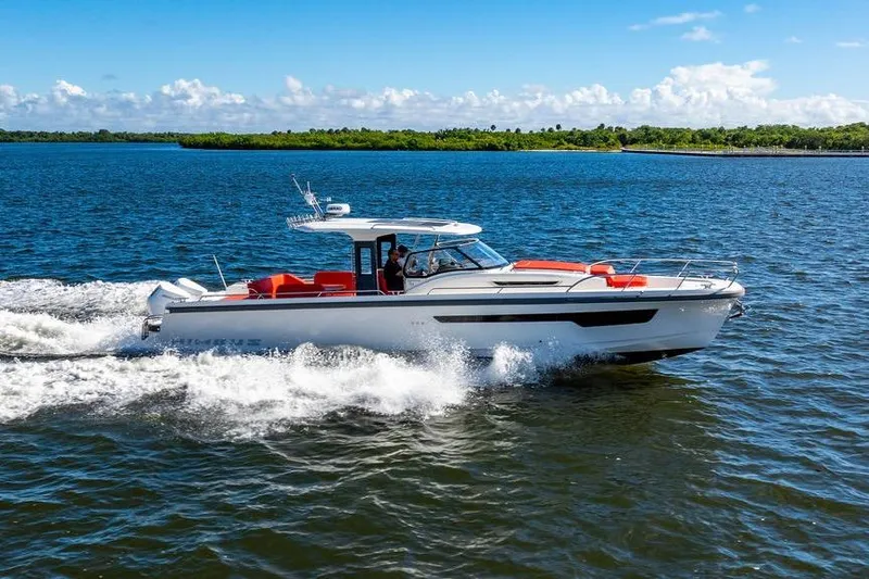 Slide: The Image of 2023 Nimbus Tender 11 cruising on a sunny day, showcasing sleek design and performance. - 29