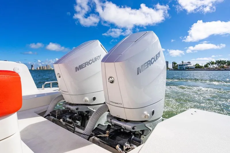 Slide: The Image of Twin Mercury outboard engines on 2023 Nimbus Tender 11 boat, cruising on a sunny day. - 39