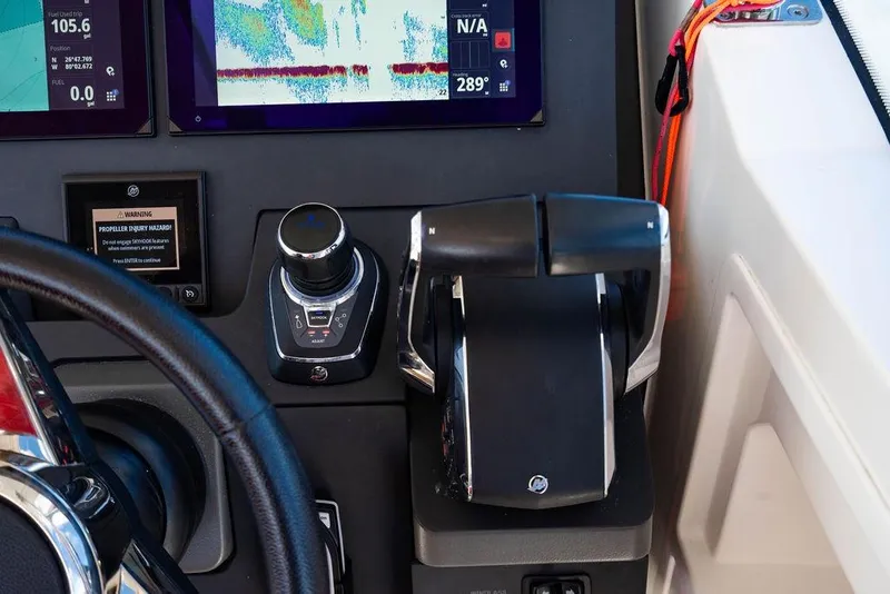 Slide: The Image of 2023 Nimbus Tender 11 dashboard with controls and navigation screens. - 7