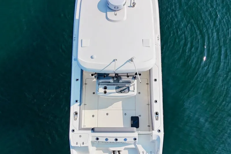 Slide: The Image of Aerial view of 2024 Boston Whaler 250 Outrage boat on clear water. - 7