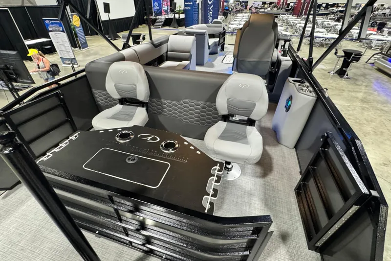 Slide: The Image of 2026 Veranda Relax VR265F2+2 pontoon boat interior with seating and control panel. - 17