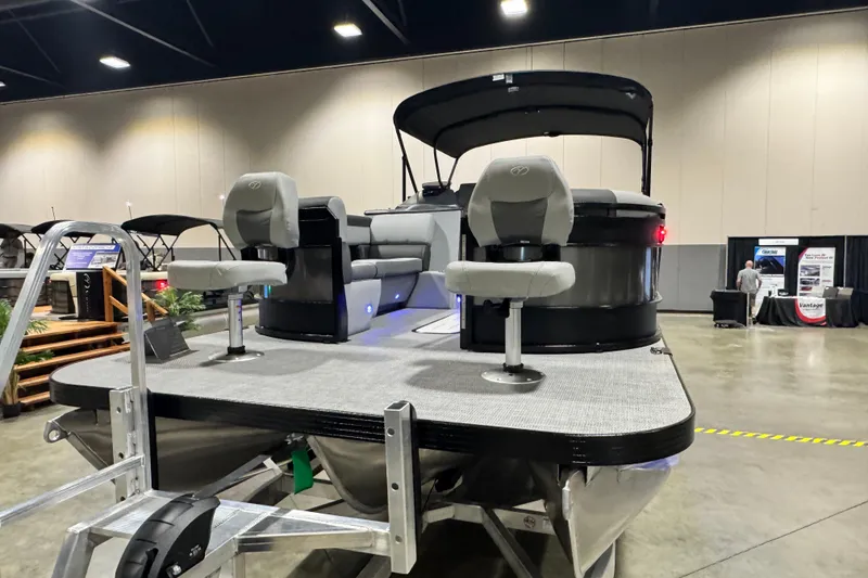 Slide: The Image of 2026 Veranda Relax VR265F2+2 pontoon boat on display indoors. - 3