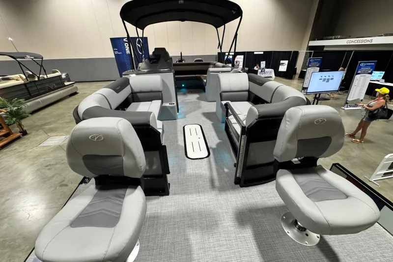 Slide: The Image of 2026 Veranda Relax VR265F2+2 pontoon boat interior at a boat show display. - 6