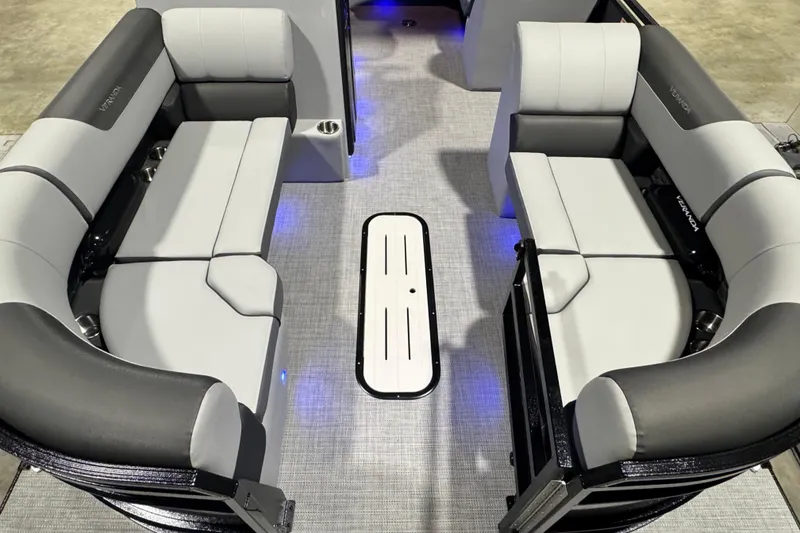 Slide: The Image of 2026 Veranda Relax VR265F2+2 pontoon boat interior with gray seating and ambient lighting. - 7