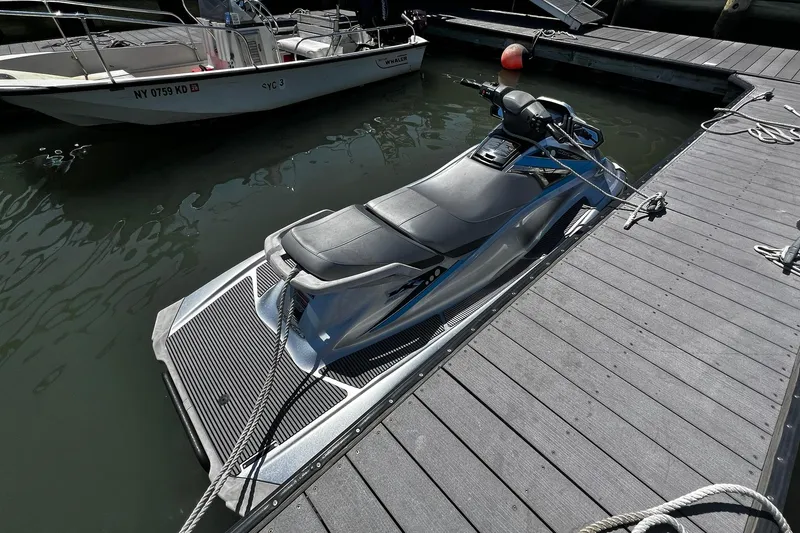 Slide: The Image of 2015 Yamaha WaveRunner VX Deluxe docked at marina, side view. - 4