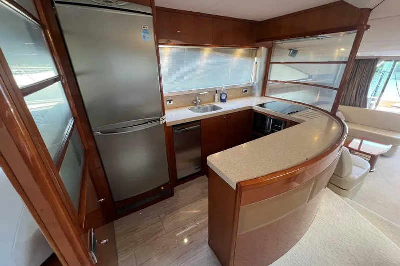Slide: The Image of Luxurious kitchen interior of 2006 Princess 67 Flybridge yacht with modern appliances. - 20