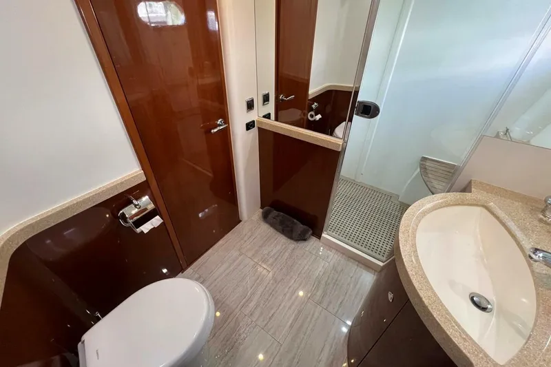 Slide: The Image of Luxurious bathroom in 2006 Princess 67 Flybridge yacht with modern fixtures and elegant design. - 32