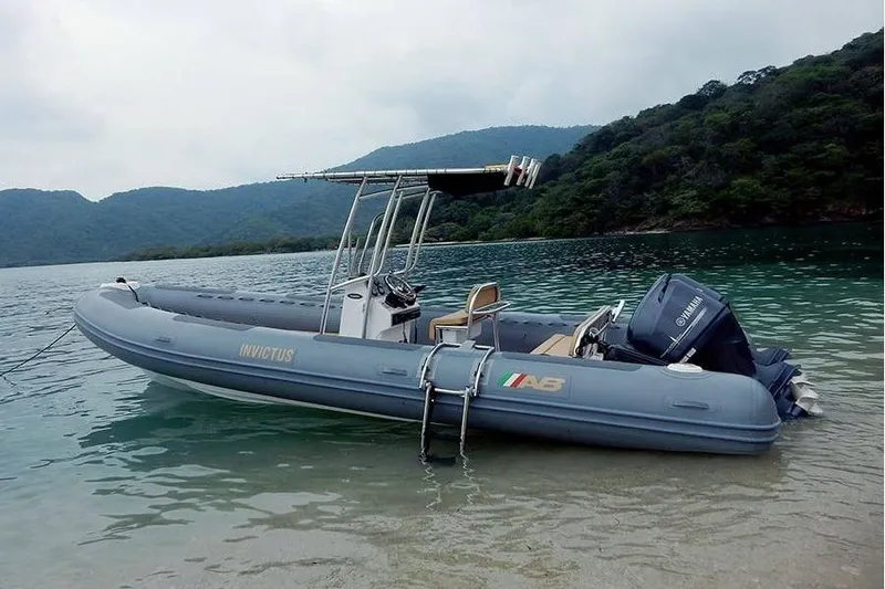 Slide: The Image of 2026 AB Inflatables Oceanus 24 VST boat on the shore. - 10