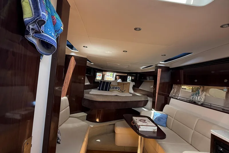 Slide: The Image of Luxurious interior of 2015 Sea Ray 350 Sundancer yacht with cozy seating and elegant decor. - 35