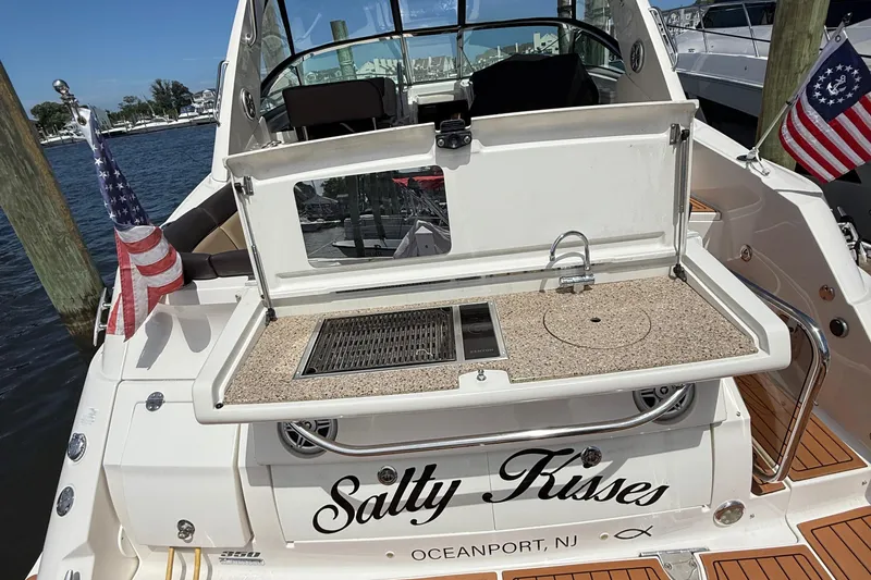 Slide: The Image of 2015 Sea Ray 350 Sundancer yacht with outdoor kitchenette, docked in Oceanport, NJ. - 6