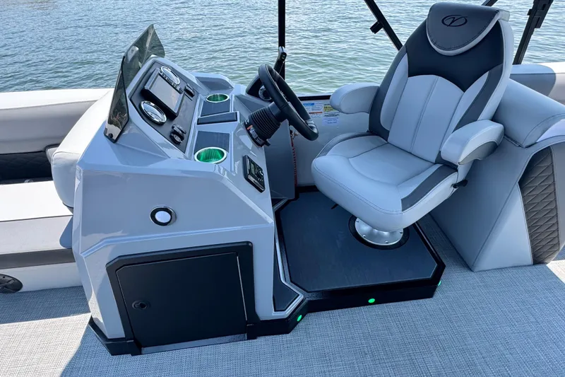 Slide: The Image of Captain's seat and console of 2026 Veranda Vista Sport VS25RC boat. - 6
