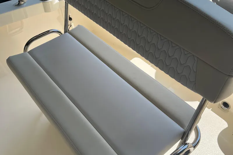 Slide: The Image of 2026 Scout 188 Sportfish boat with Yamaha outboard engine in showroom. - 4