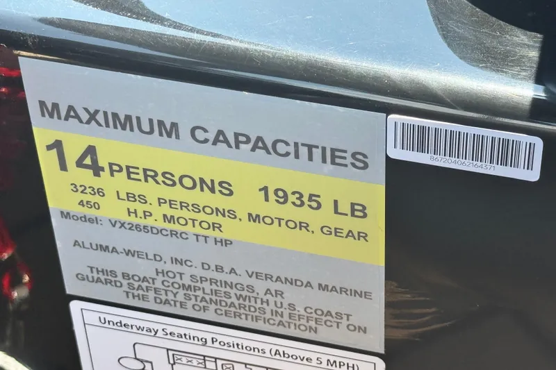 Slide: The Image of Capacity label for Veranda Vertex VX285DCRC, 2026 model, showing 14 persons, 1935 lbs limit. - 10