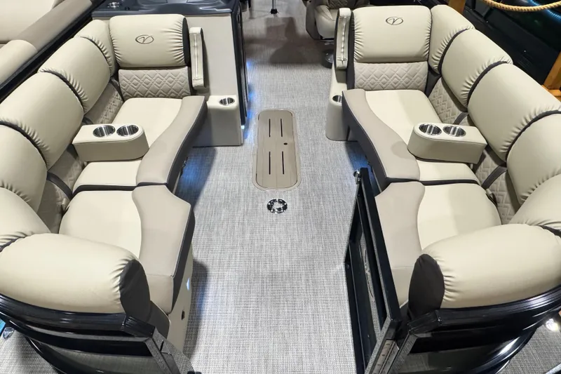 Slide: The Image of Luxurious interior of 2026 Veranda Relax VR235RCP pontoon boat with plush seating and cup holders. - 3