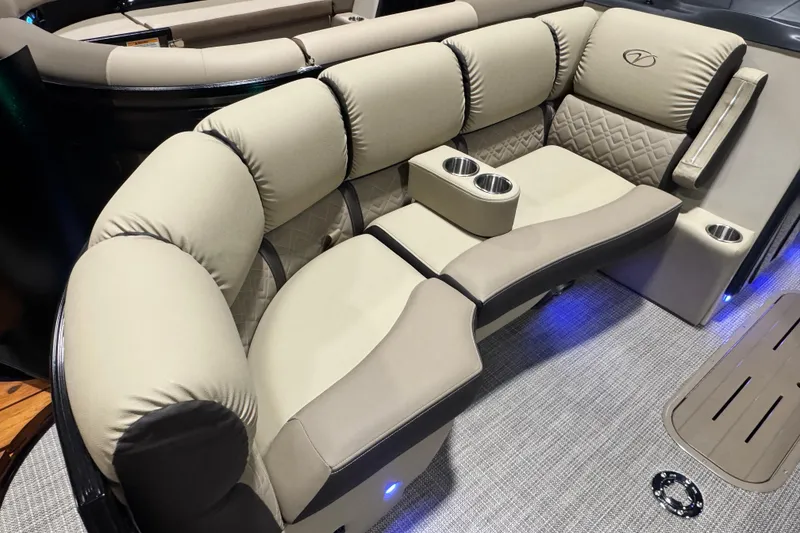 Slide: The Image of Luxurious seating on 2026 Veranda Relax VR235RCP pontoon boat with cup holders and ambient lighting. - 4