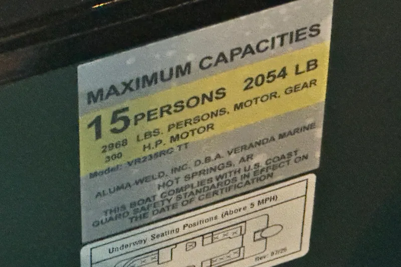 Slide: The Image of 2026 Veranda Relax VR235RCP capacity label: 15 persons, 2054 lbs, 300 HP motor. - 7