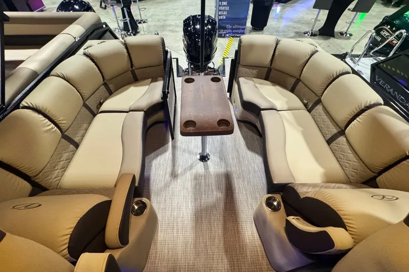 Slide: The Image of Luxurious interior of 2026 Veranda Relax VR235RCP pontoon boat with plush seating and table. - 9