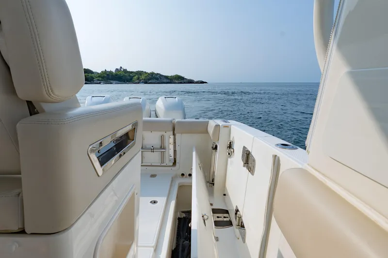 Slide: The Image of 2019 Boston Whaler 350 EX REALM boat interior with ocean view. - 18